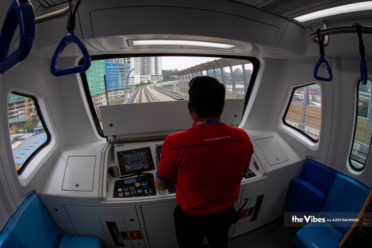 An employee is operating the Putrajaya MRT line train ahead of tomorrow’s launch. – AZIM RAHMAN/The Vibes pic, March 15, 2023