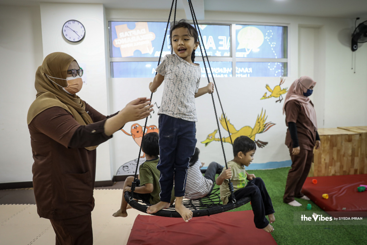 Dr Siti Shahiszma watches over some children as they play. – SYEDA IMRAN/The Vibes, April 2, 2023
