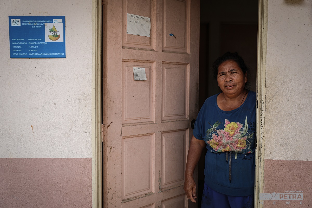 Yudi Amoi, 62, shows her house and the spacious compound she shares with her children, which was built in April 2015 under Datuk Seri Ismail Sabri Yaakob’s watch. – SYEDA IMRAN/The Vibes pic, November 11, 2022