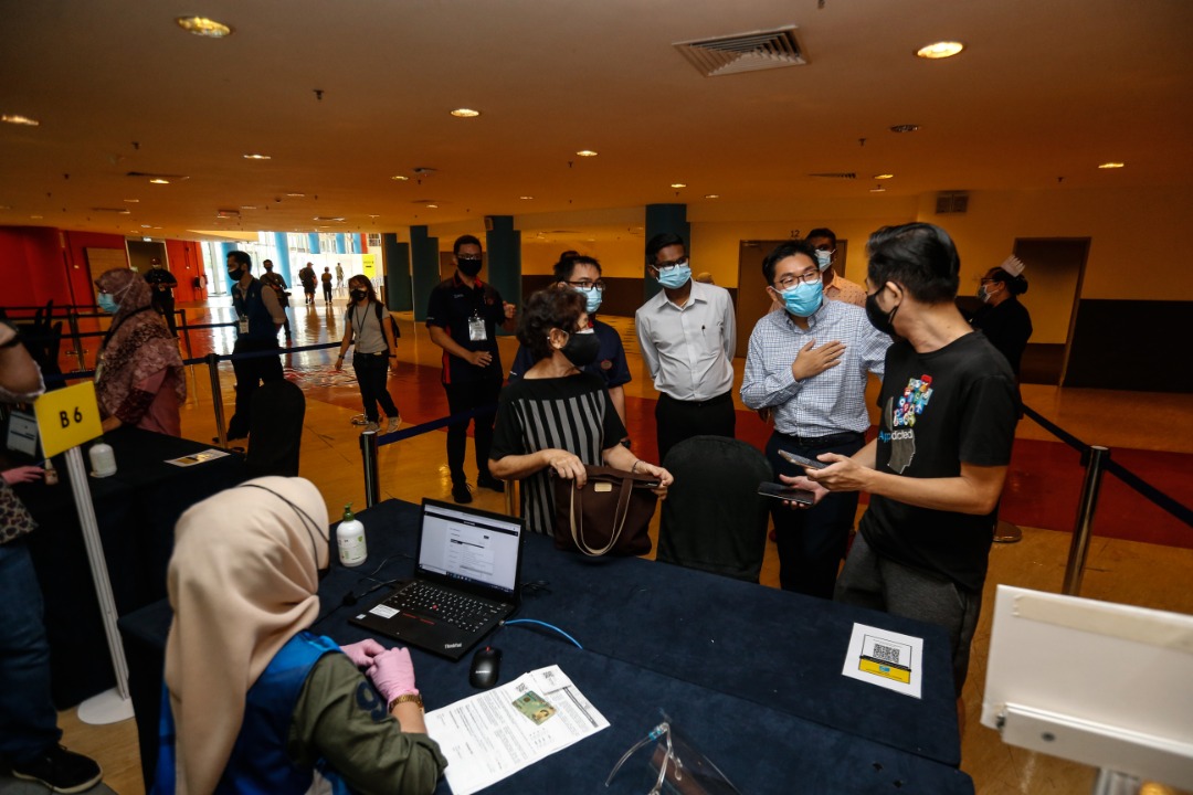 Bayan Baru MP Sim Tze Tzin (second from right) says the private sector can play a role in increasing vaccination numbers. – SOFIA NASIR/The Vibes pic, June 12, 2021