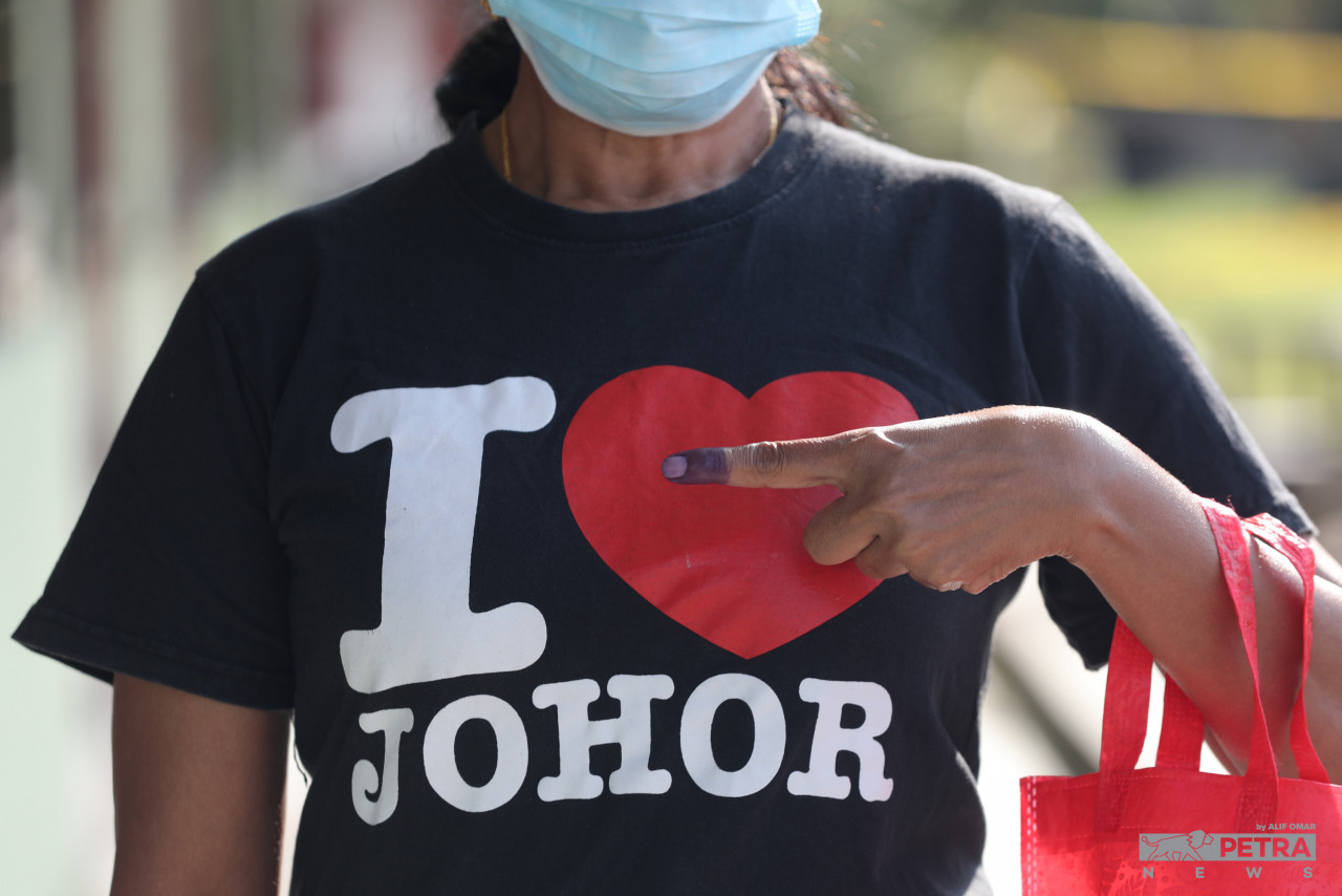 The Election Commission announces 22% voter turnout as of 11am. – ALIF OMAR/The Vibes pic, March 12, 2022