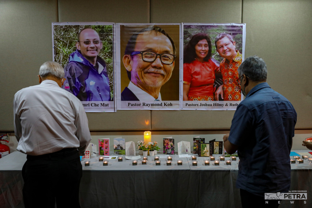 Apart from Pastor Raymond Koh (centre photograph) and Amri Che Mat (left photograph), vigilants also pay tribute to Pastor Joshua Hilmy, a Muslim-to-Christian convert, and his Indonesian wife Ruth Sitepu. – AZIM RAHMAN/The Vibes pic, February 14, 2022