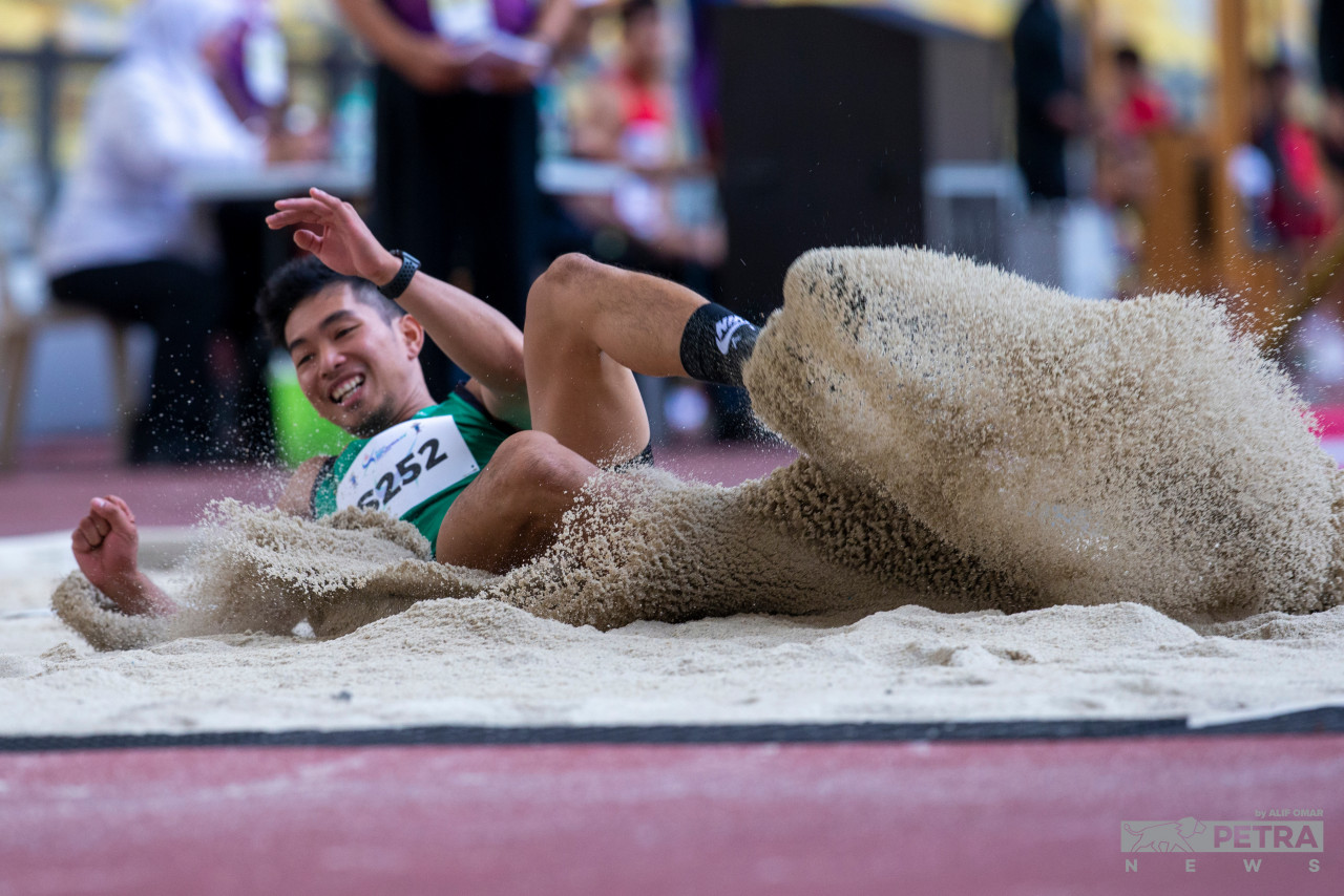 Sabah’s Andre Anura Anuar wins gold in the men’s long jump after clearing a distance of 7.40m to claim his victory. – ALIF OMAR/The Vibes pic, September 16, 2022.