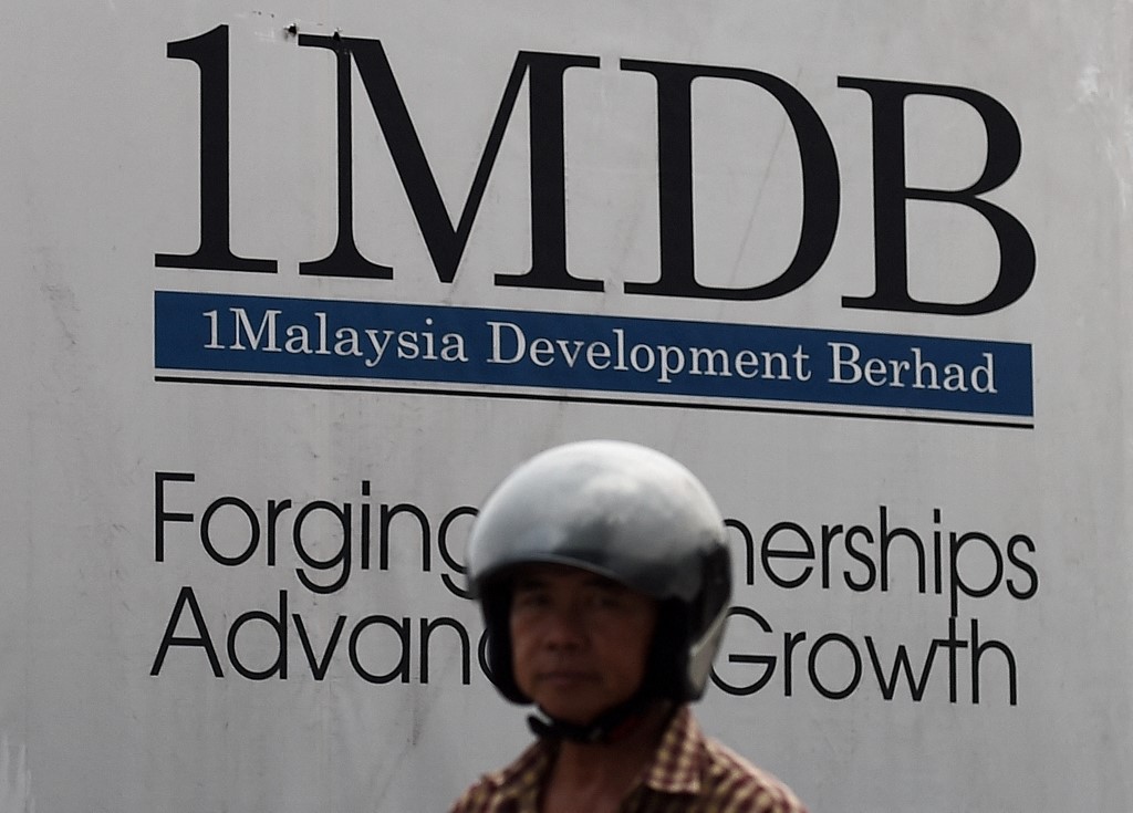 Likening Digital Nasional Bhd to failed state investment vehicle 1Malaysia Development Bhd is just lazy politics, says veteran newsman Zainul Arifin Mohammed Isa. – AFP pic, December 23, 2021
