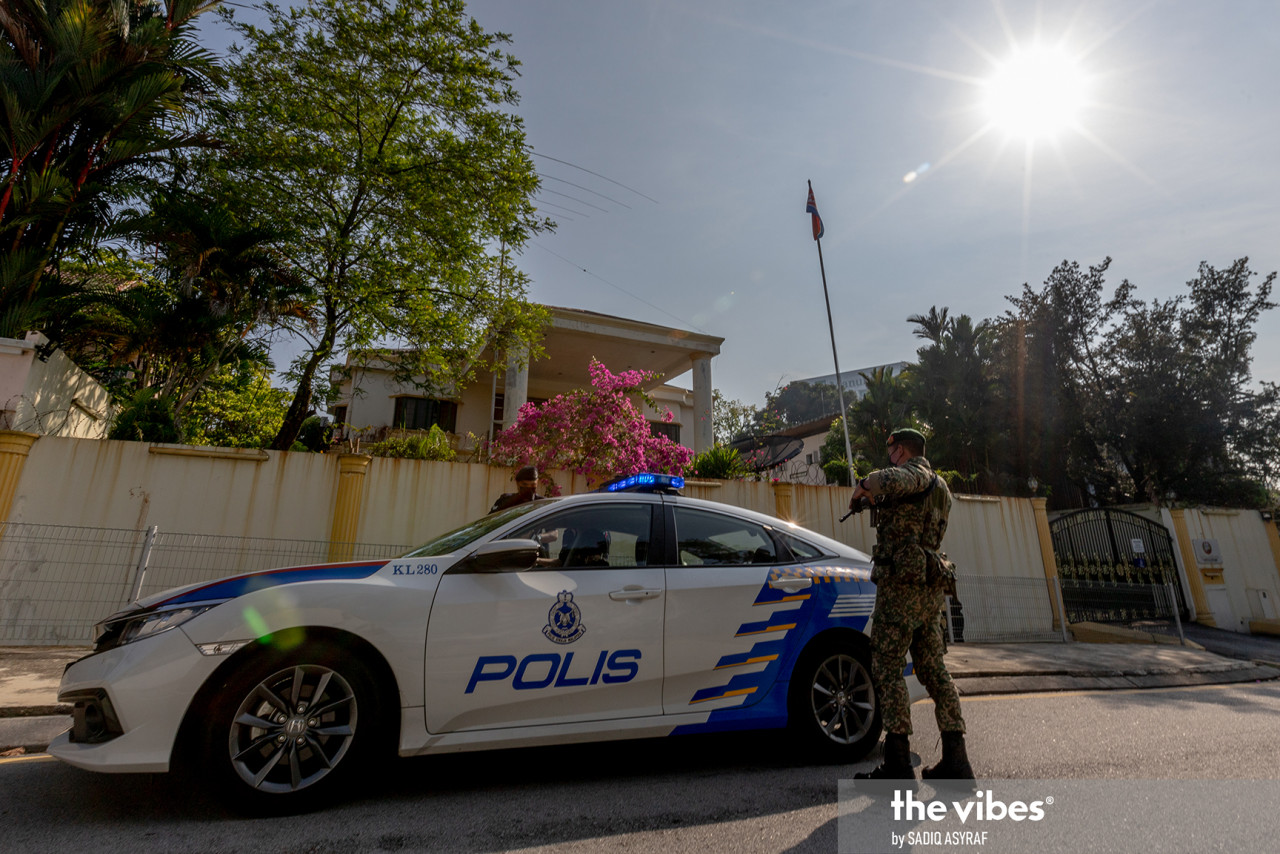 A police patrol car and security personnel outside the North Korean embassy today. – SADIQ ASYRAF/The Vibes pic, March 20, 2021