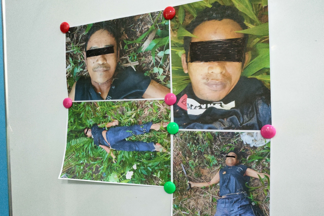 Photos of the bodies of two men, who were allegedly Abu Sayyaf members, with a .45 Colt and machete. – The Vibes file pic, August 20, 2021