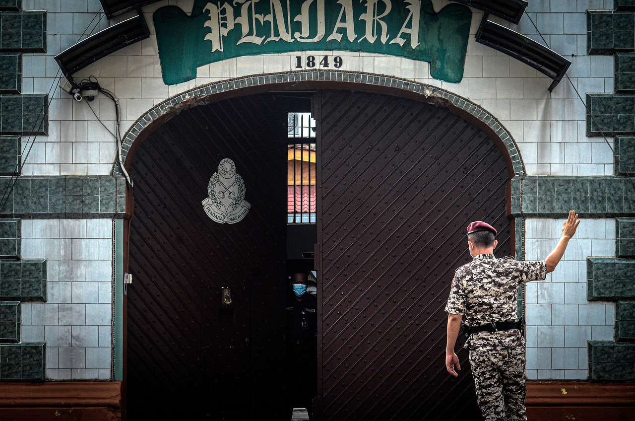 A guard stands outside the Penang Remand Prison. Across the globe, different countries have developed different types of criminal justice systems to ensure maximum compliance to the law. – Bernama pic, September 5, 2022