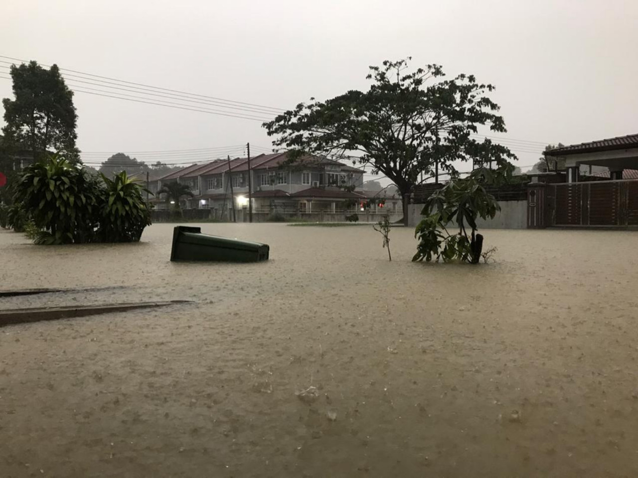 Floodwaters rising drastically in Lundu as rain continues to pour today. – Sarawak Fire and Rescue Dept pic, February 19, 2021