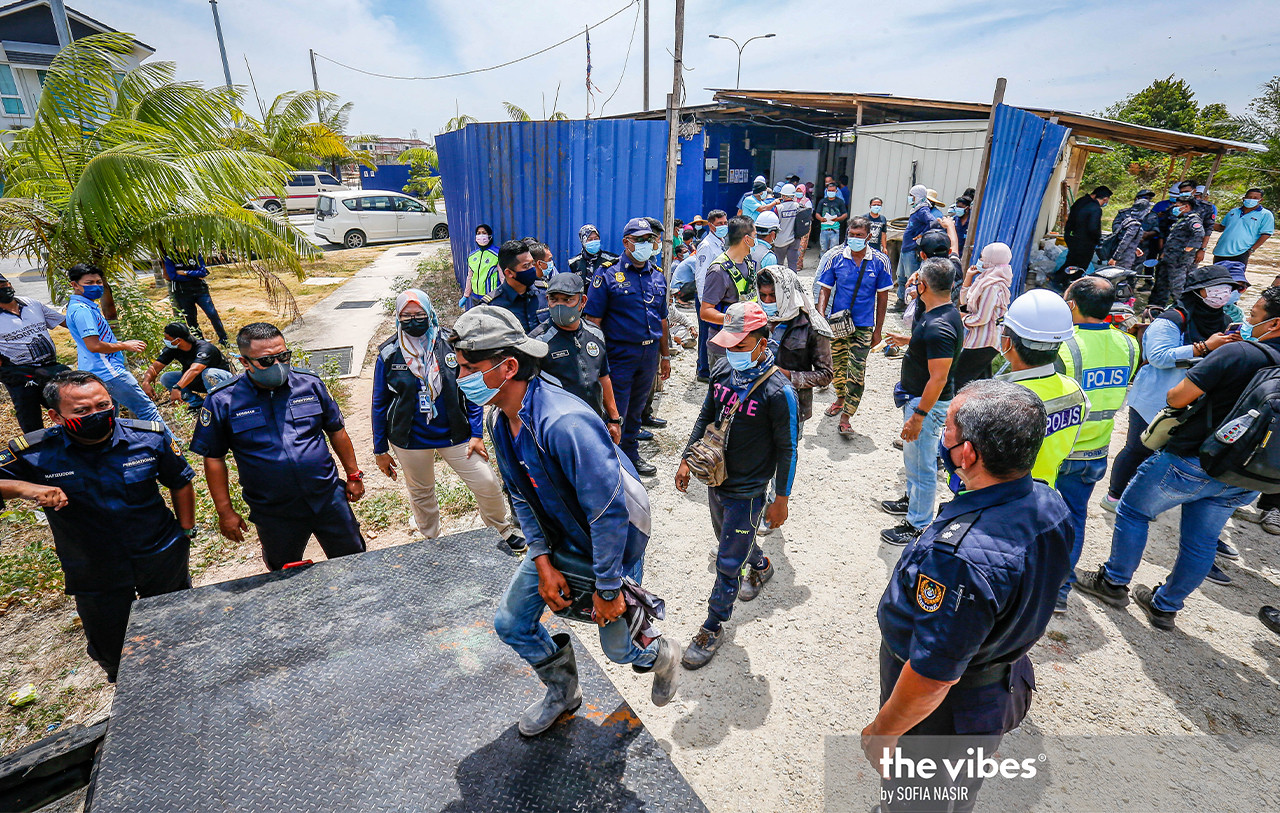 Many of the workers held in the raid had no valid identity documents and expired visas. – SOFIA NASIR/The Vibes pic, February 25, 2021