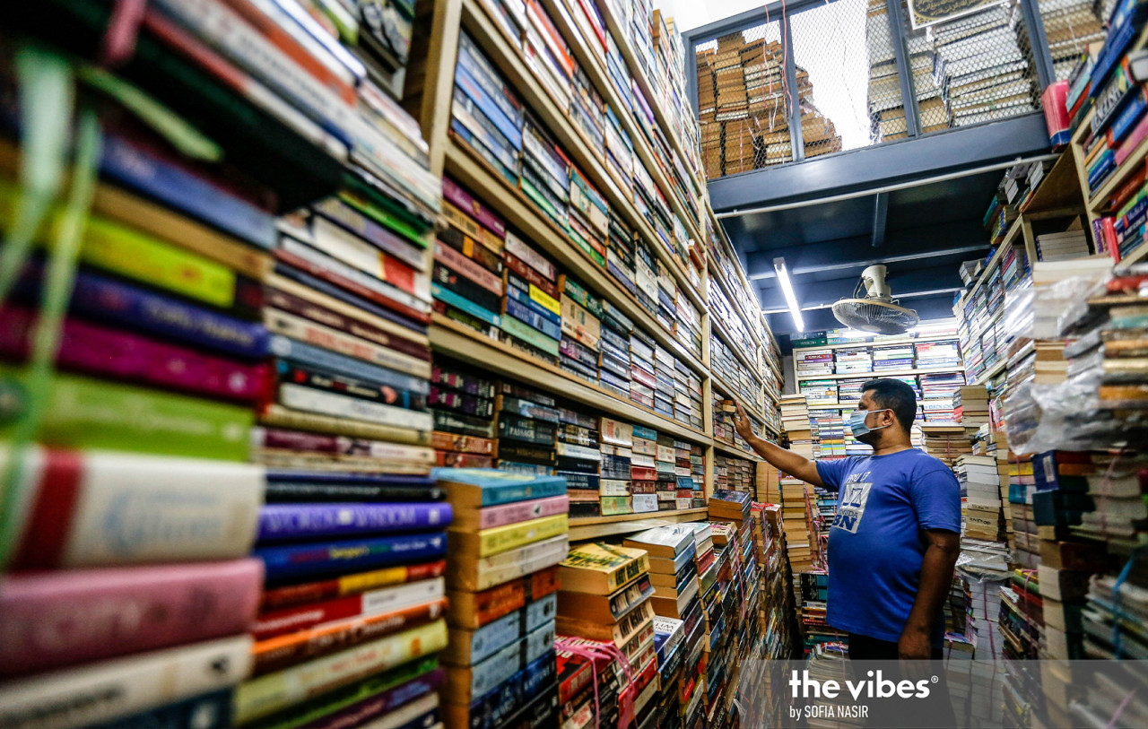 Bookseller Mohamed Assalam Gulam Mohamed says he has little choice but to keep his store open, despite the lockdown driving away customers. – SOFIA NASIR/The Vibes pic, March 6, 2021
