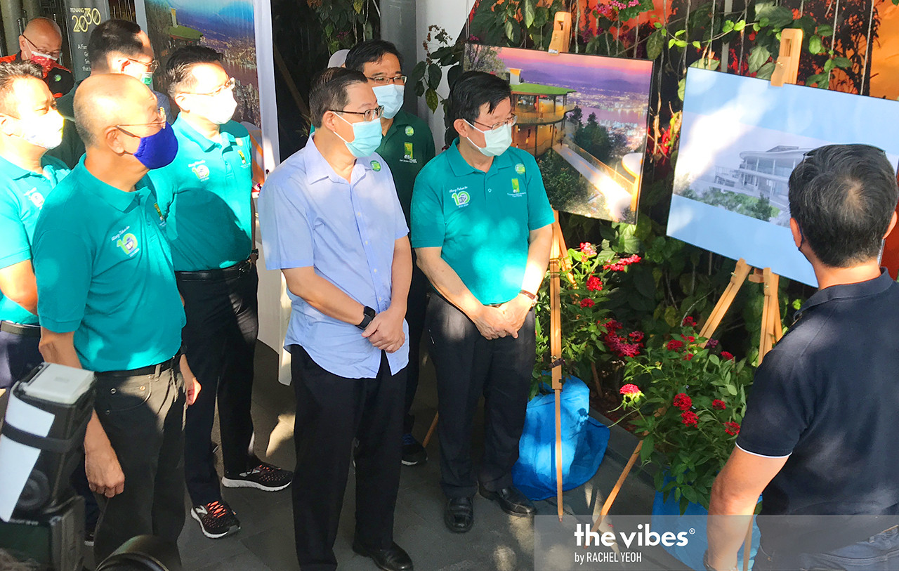 Penang Chief Minister Chow Kon Yeow (second from right) looking at plans at the official launch of upgrading works at Penang Hill today. – RACHEL YEOH/The Vibes pic, March 20, 2021