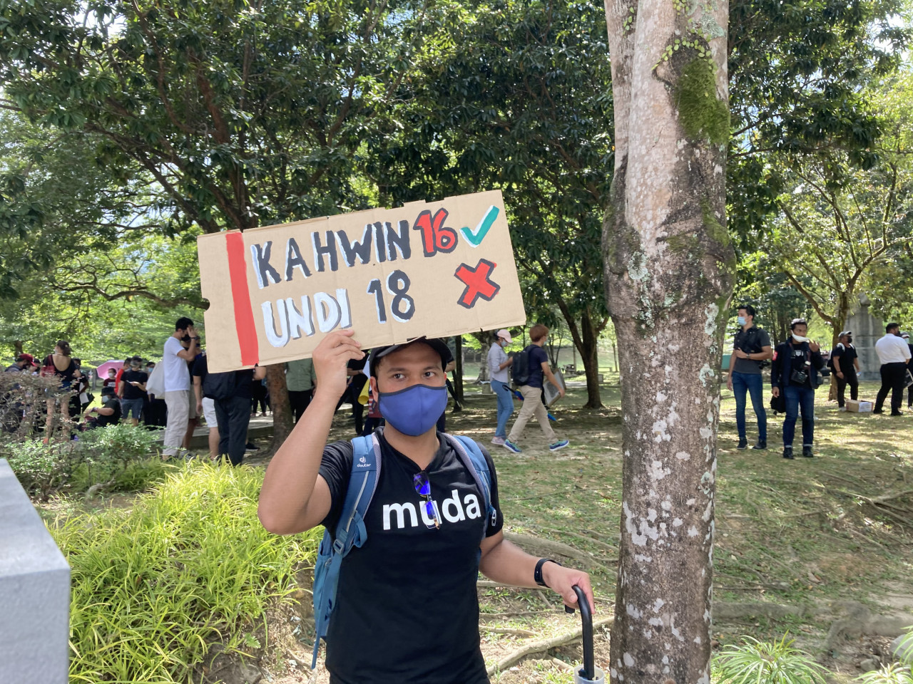 A protester holding up a sign criticising the Election Commission’s tardiness in lowering the voting age. – LANCELOT THESEIRA/The Vibes pic, March 27, 2021