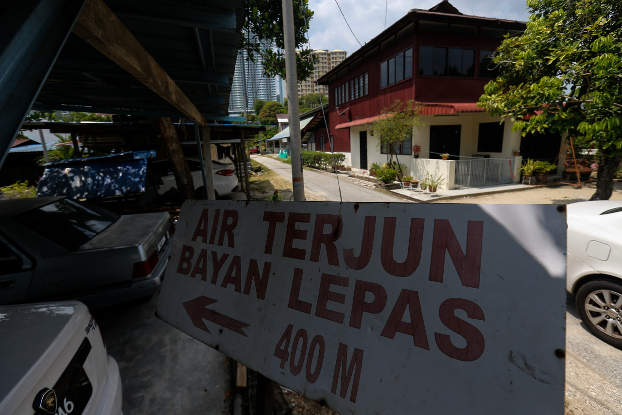 Villager Mohamad Roslan Abu Bakar, 60, says the Bayan Lepas Waterfall area is a far cry from what it used to be. – SOFIA NASIR/The Vibes pic, April 17, 2021
