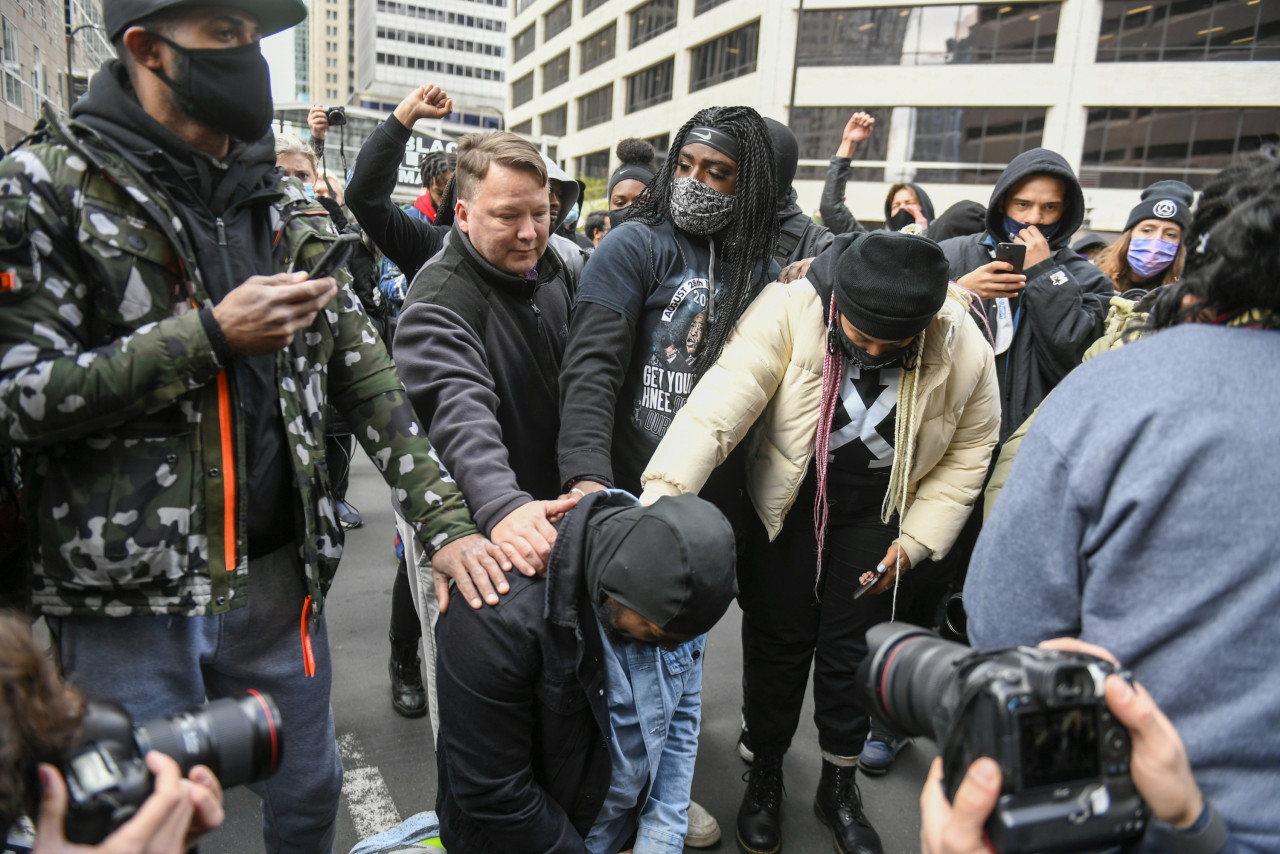 A crowd gathered outside the heavily guarded downtown Minneapolis courtroom erupted in cheers when the verdicts were announced after the three-week trial. – EPA pic, April 21, 2021