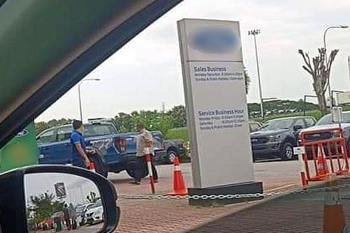 A photo allegedly of Kedah Menteri Besar Muhammad Sanusi Md Nor at a vehicle sale and exhibition centre at Autocity Juru. – Bernama Twitter pic, June 6, 2021