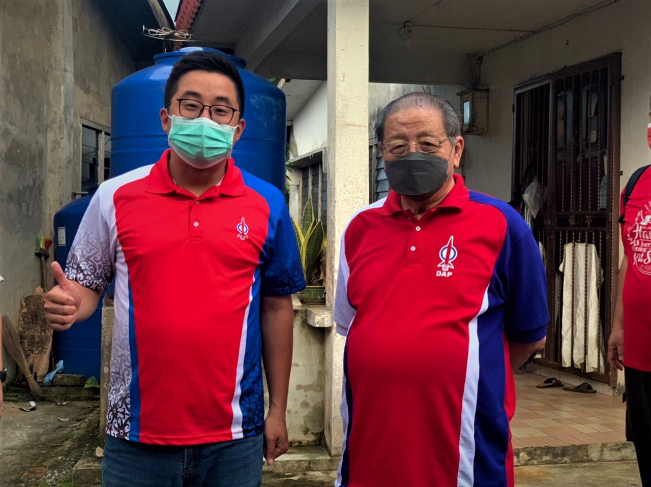 DAP supremo Lim Kit Siang (right) accompanying Leslie Ting on one of his walkabouts in Kg Quop. – DAP pic, December 17, 2021