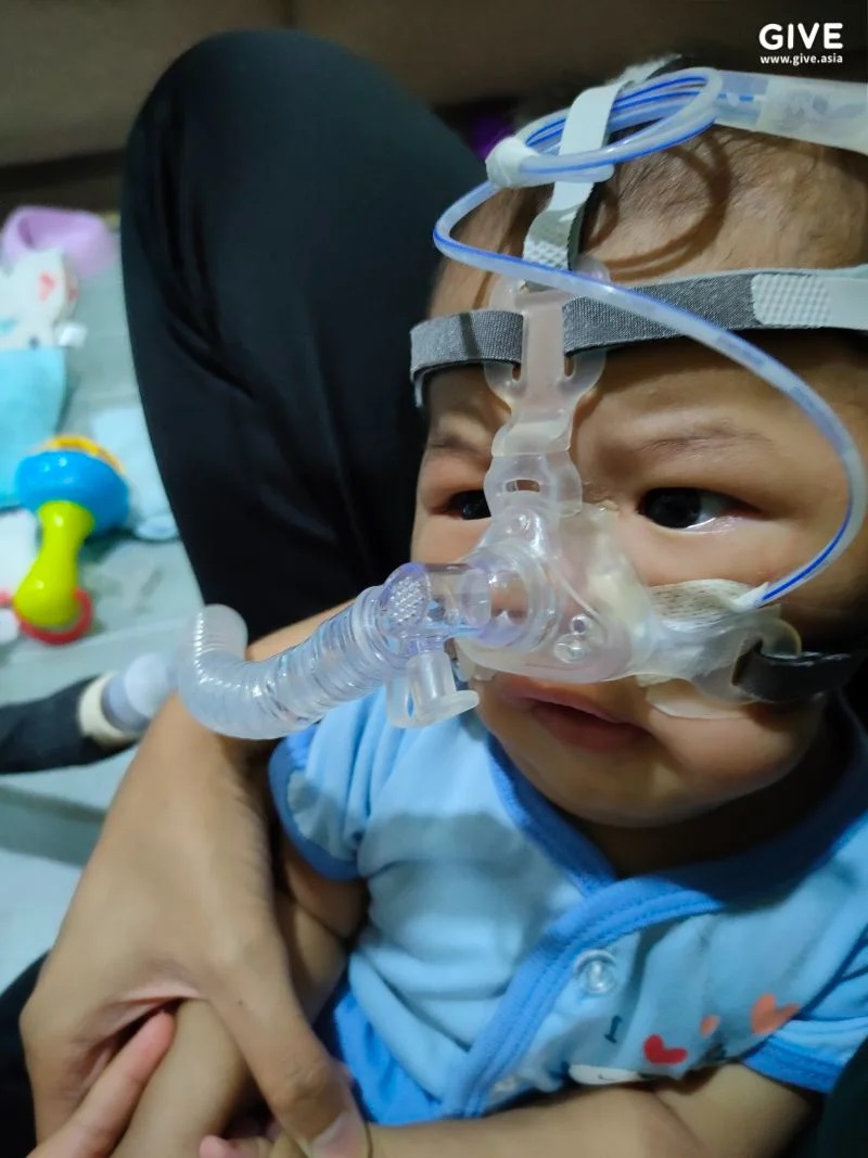 Athif Fahri Muhammad Farhan has been suffering from a weakened respiratory system, and has needed respiratory support all the time since he was three months old. – Give.asia pic, March 24, 2023