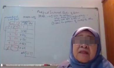 In the leaked video, which had gone viral, a professor is heard berating a student for attending her online class using his phone, saying the student should already own a computer as he was already in his fifth semester. – Screengrab pic, April 1, 2022