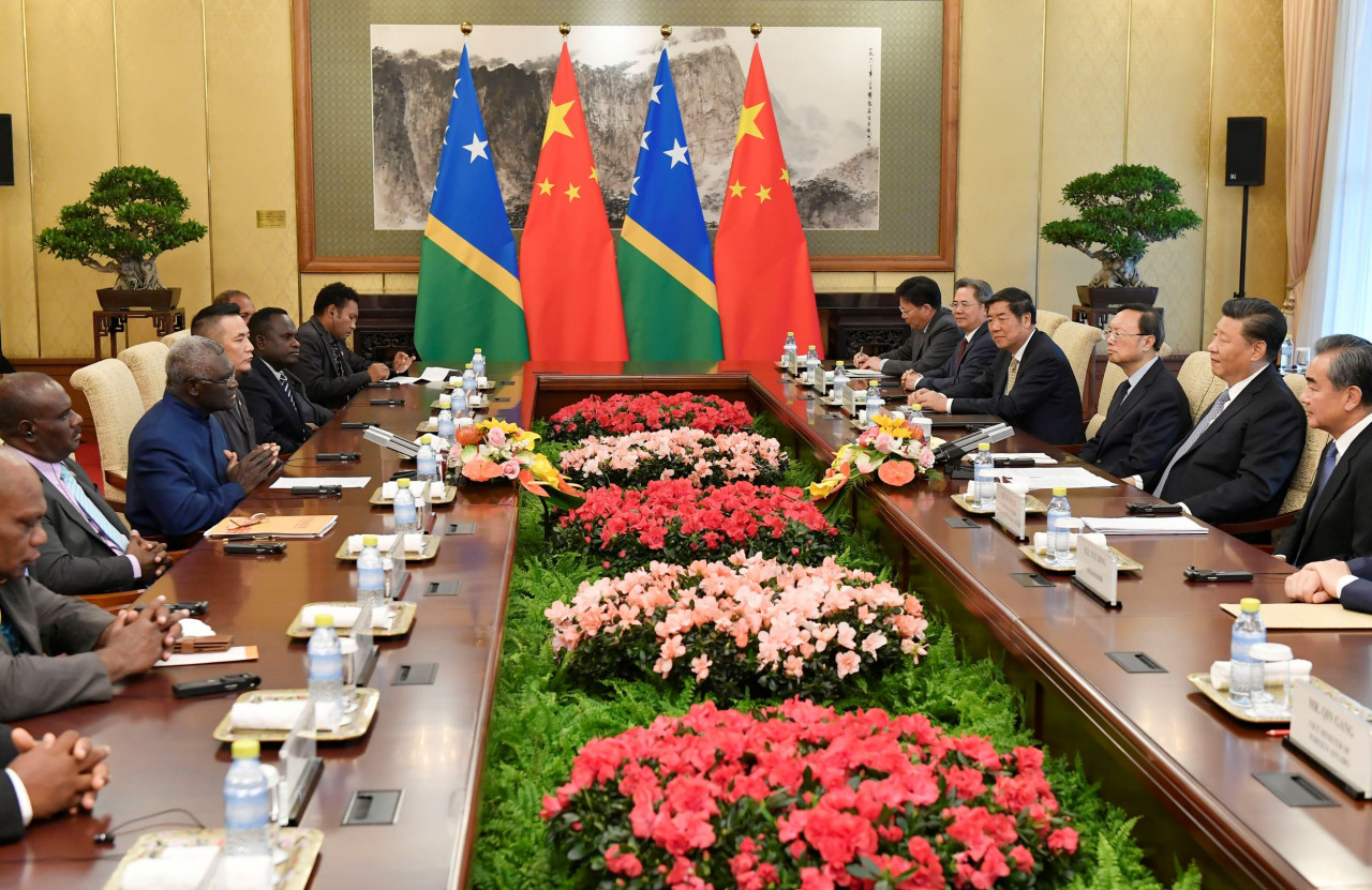 Solomon Islands Prime Minister Manasseh Sogavare (third left) speaks with Chinese President Xi Jinping (second right) during their meeting in Beijing on October 9, 2019. The Solomon Islands said on March 31 this year it had inked a wide-ranging security pact with Beijing. – AFP pic, July 11, 2022