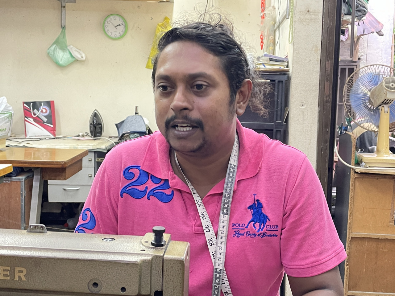 Tailor Mohd Redzuan Abdul Aziz says orders for Raya clothing at his shop this year have increased more than fivefold compared with last year. – SOFIA NASIR/The Vibes pic, May 4, 2022