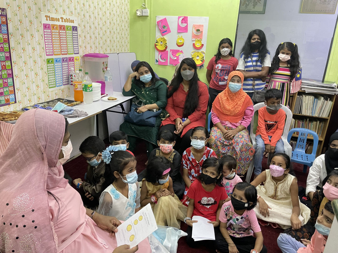 Aysha’s students listen with rapt attention as she delivers the day’s lesson. Many refugee parents see education as the way for their children to escape their situation. – DHARSHINI GANESON/The Vibes pic, May 16, 2022