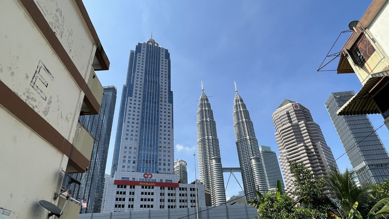The Petronas Twin Towers as seen from one of the low-cost flat blocks in Kg Sg Baru. – LANCELOT THESEIRA/The Vibes pic, May 16, 2022