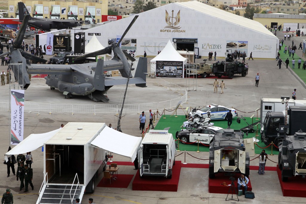 In this photo from May 6, 2014, people are seen visiting the Special Operations Forces Exhibition and Conference trade show at King Abdullah I Airbase in Amman, Jordan. According to the writer, public opinion alone is typically not enough – even in democracies – to prompt governments to practise arms-trade restraint. – AFP pic, August 30, 2022