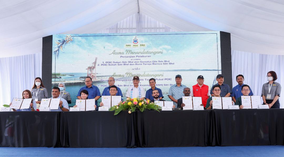 Signatories from Bumi Teraju Sdn Bhd, Palm Oil Industrial Cluster Sabah Sdn Bhd and Gamalux Oils Sdn Bhd pose with the agreements inked in Lahad Datu. – Pic courtesy of POIC Sabah, September 9, 2022  