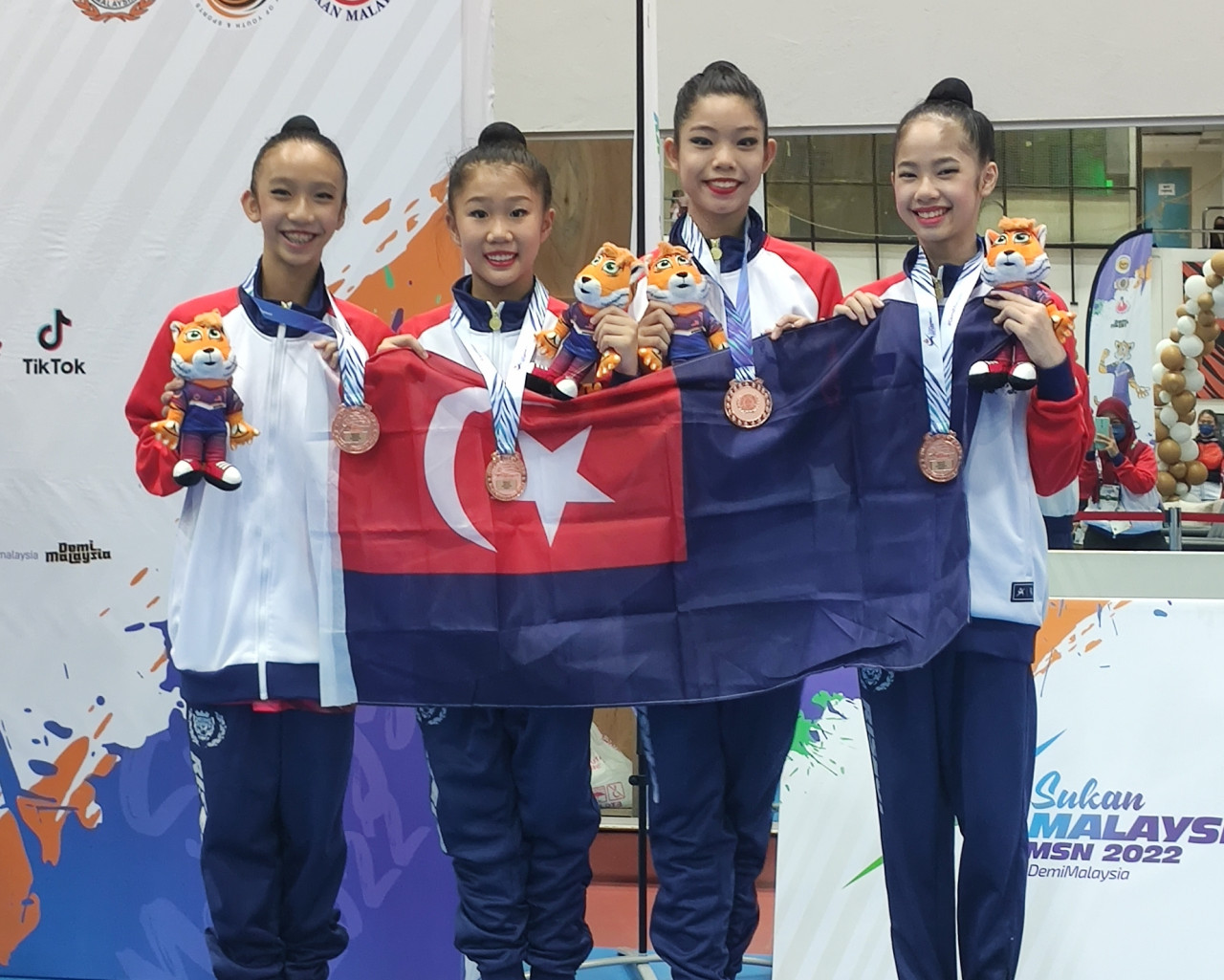 Eva Goh Hann Ning (second from left) with her rhythmic gymnastics team’s all-around bronze medal after her debut at the 2022 Malaysia Games held in September in Bukit Jalil. – Pic courtesy of Eva Goh Hann Ning, October 23, 2022