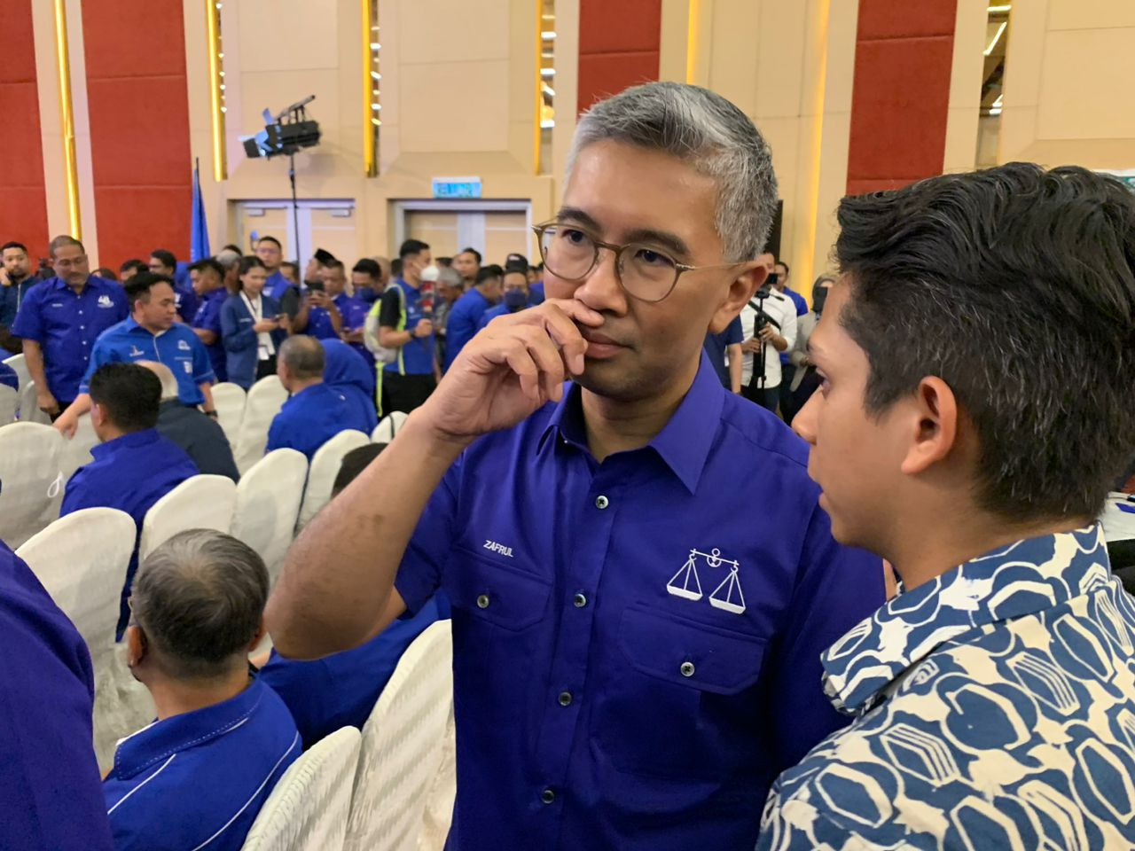 Datuk Seri Tengku Zafrul Tengku Abdul Aziz (centre) appears at Barisan Nasional’s event announcing its candidates for the general election at the World Trade Centre in Kuala Lumpur, today. – AMAR SHAH MOHSEN/The Vibes pic, November 1, 2022