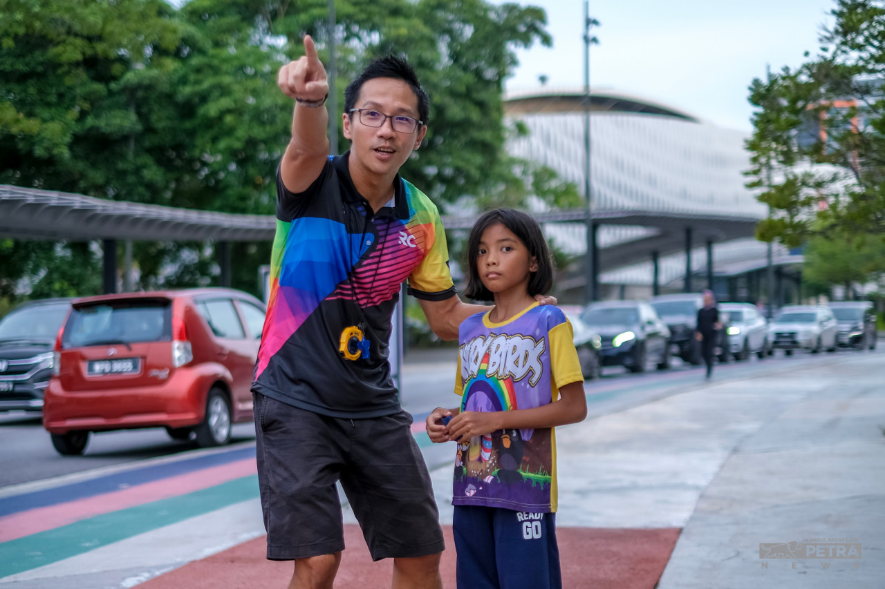 Rupert Chen (left) suggests Ironman newcomers start with shorter race distances before attempting the full Ironman. – ABDUL RAZAK LATIF/The Vibes, November 4, 2022