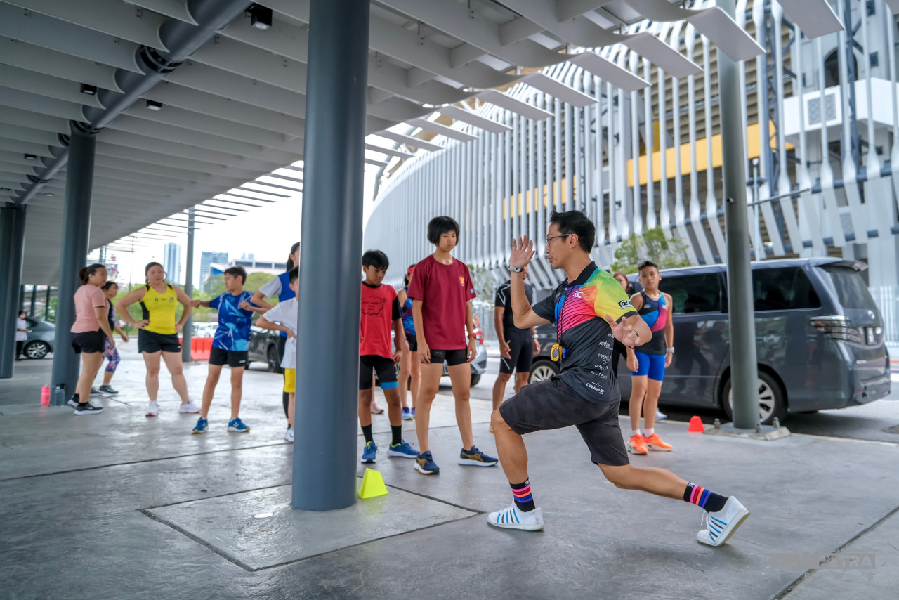 Rupert Chen (right) says each stage of an Ironman race takes a toll on the body, so energy management is essential. – ABDUL RAZAK LATIF/The Vibes, November 4, 2022