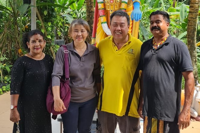 Belinda Yeap (second from left) and Peter Hoo (second from right) have said that the Kuala Langat Municipal Council staff members were very helpful in helping them transport the dogs to a shelter at a temple in Johor. However, 14 dogs did not make it and was sent off in a cremation ceremony by Padmarajan, the temple owner (right). – Pic courtesy of Belinda Yeap & Peter Hoo, January 16, 2023