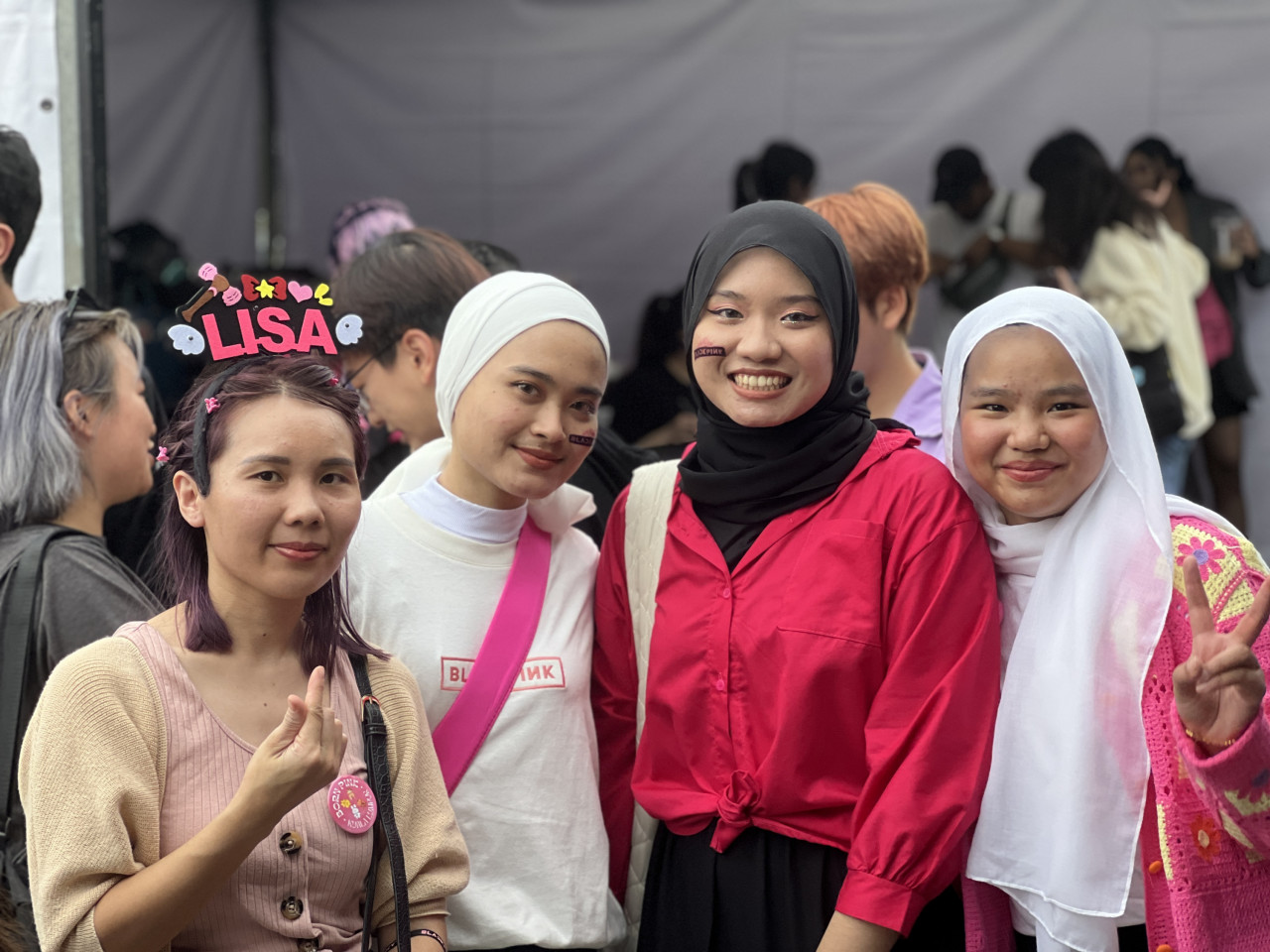 A pair of close friends who go by Naza (second left) and Nuna (right) opine that Blackpink would not have been globally famous and chart-topping artists if the members were not skilled performers. – ADAM AYZZAT/The Vibes pic, March 4, 2023