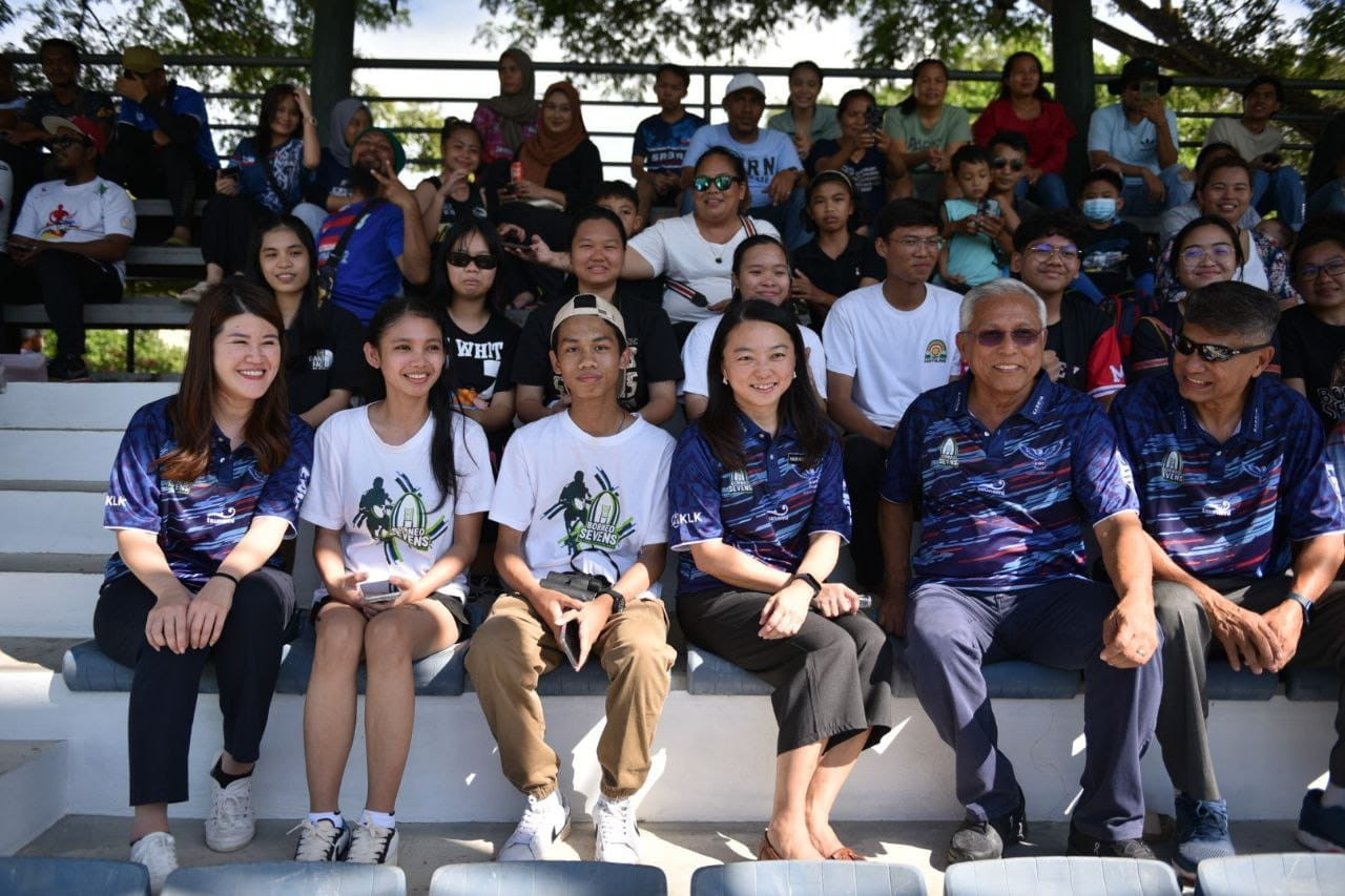Youth and Sports Minister Hannah Yeoh (bottom, third right) and Sandakan MP Vivian Wong (bottom left) enjoy the rugby action at this year’s Borneo Sevens in Sandakan, Sabah. – Hannah Yeoh Facebook pic, March 21, 2023
