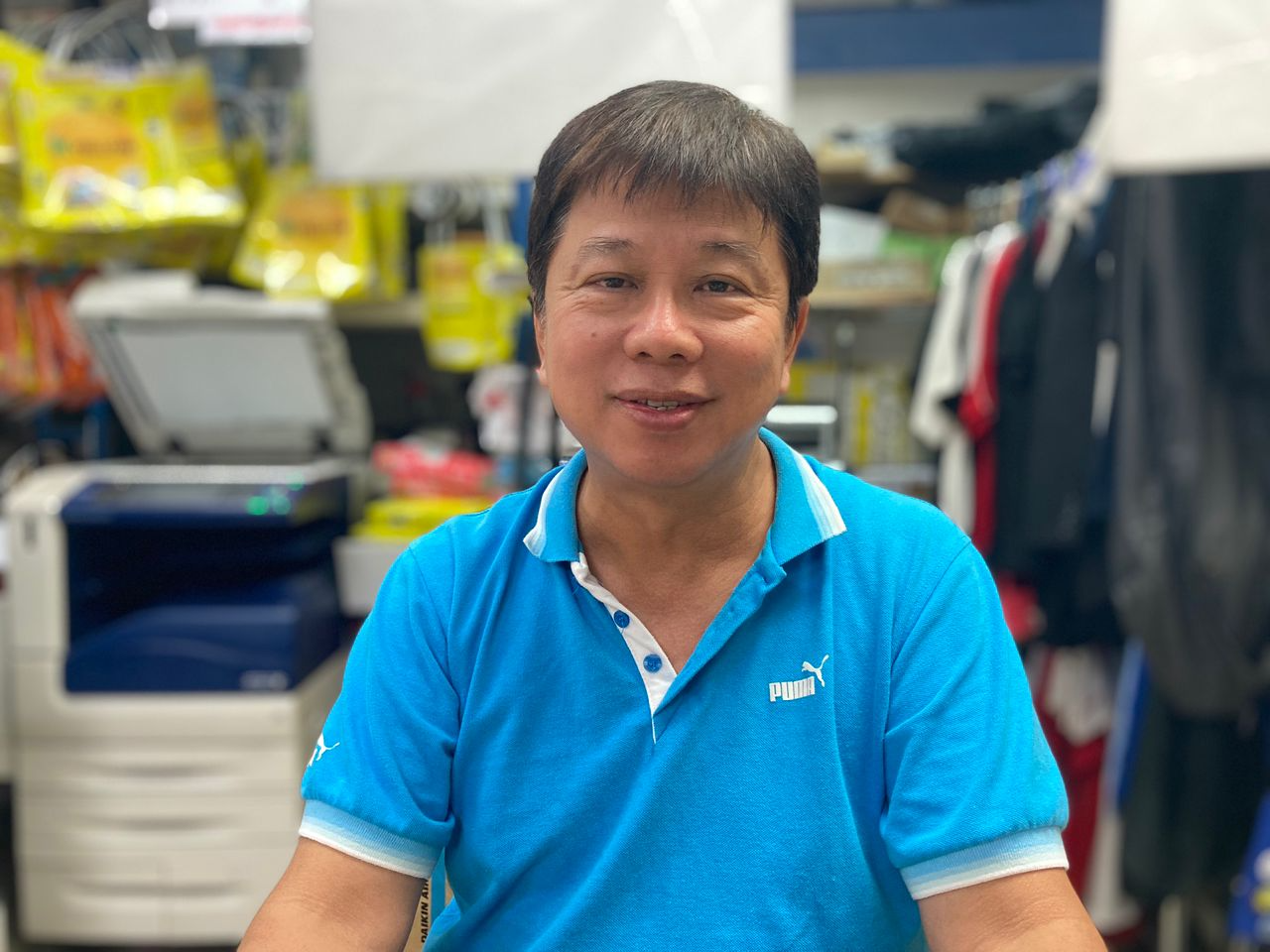 Winson Low (pic), a friend of Benedict Lopez who runs a stationary shop, says that he knows that if anything needs fixing, he can call and make a complaint with Lopez, who will ensure it gets fixed. – MAITHILLI KALAISELVAN/The Vibes pic, April 26, 2023