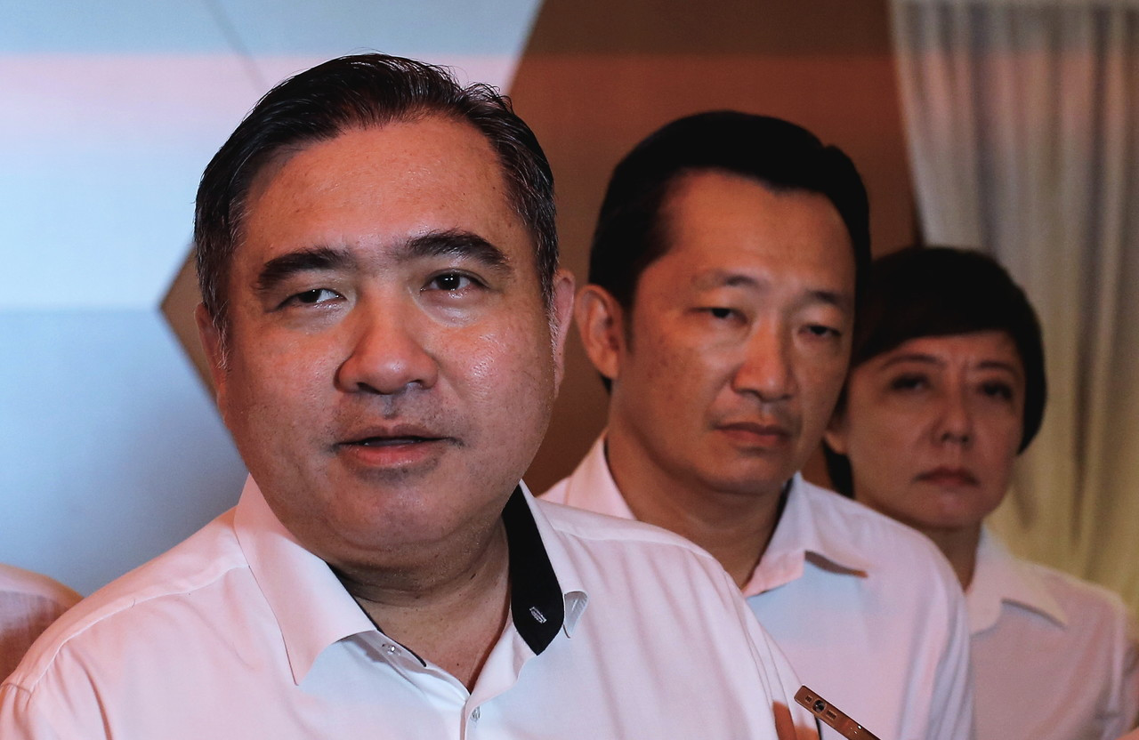 Single mother Anna Asmael from Sandakan says the spat between Transport Ministry Anthony Loke (left) and Datuk Seri Wee Ka Siong is futile and does not help solve the real problem. – Bernama pic, April 18, 2023