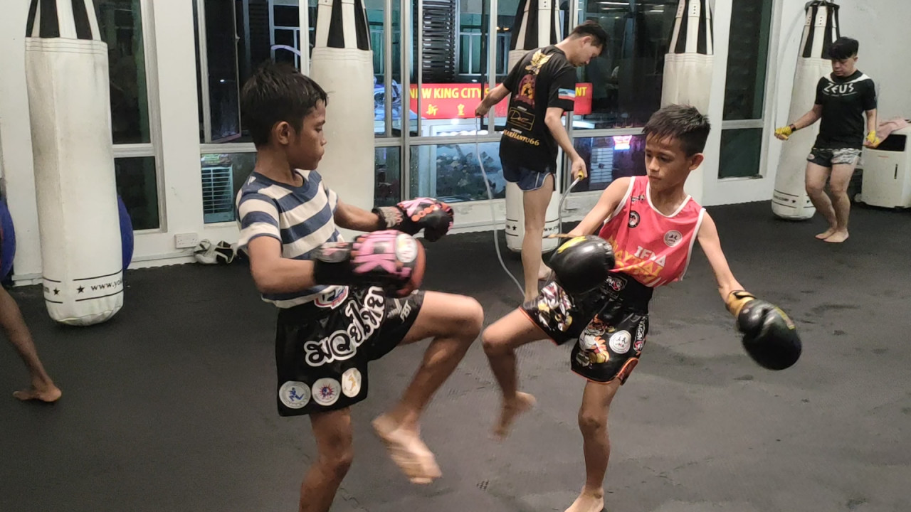 Dazaisy Hafie Aznee (right), 10, does five hours of intense training every day, and although exhausted, he keeps on going. – REBECCA CHONG/The Vibes pic, August 28, 2022