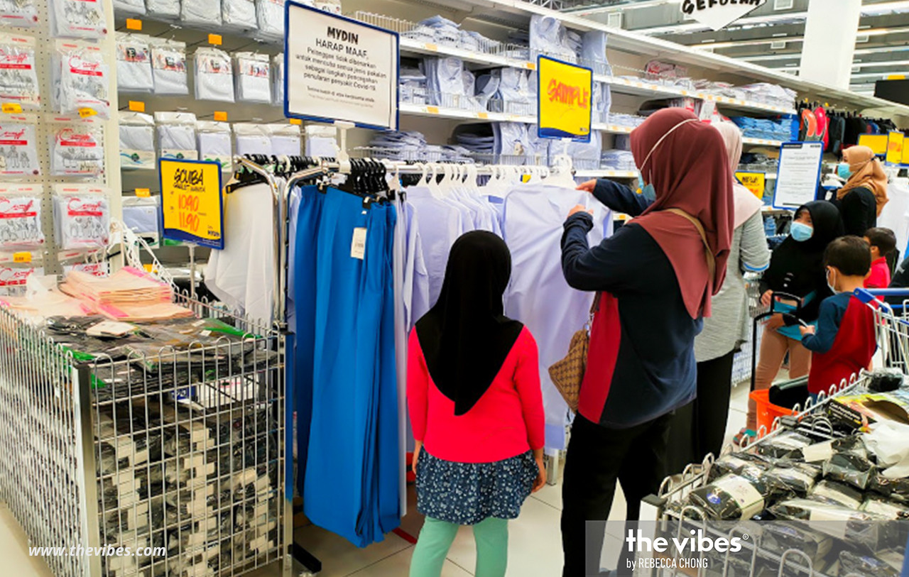 The scene is repeated in Mydin Hypermarket, as families rush to get their kids ready for tomorrow. – REBECCA CHONG/The Vibes pic, February 28, 2021