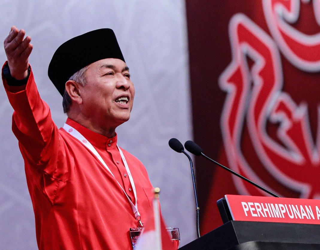 Umno president Datuk Seri Ahmad Zahid Hamidi (pic) is accused by Datuk Seri Mohamed Nazri Abdul Aziz of plotting to get party MPs without government appointments to withdraw their support for the prime minister ‘one by one, until the government falls’. – Umno Online pic, July 2, 2021