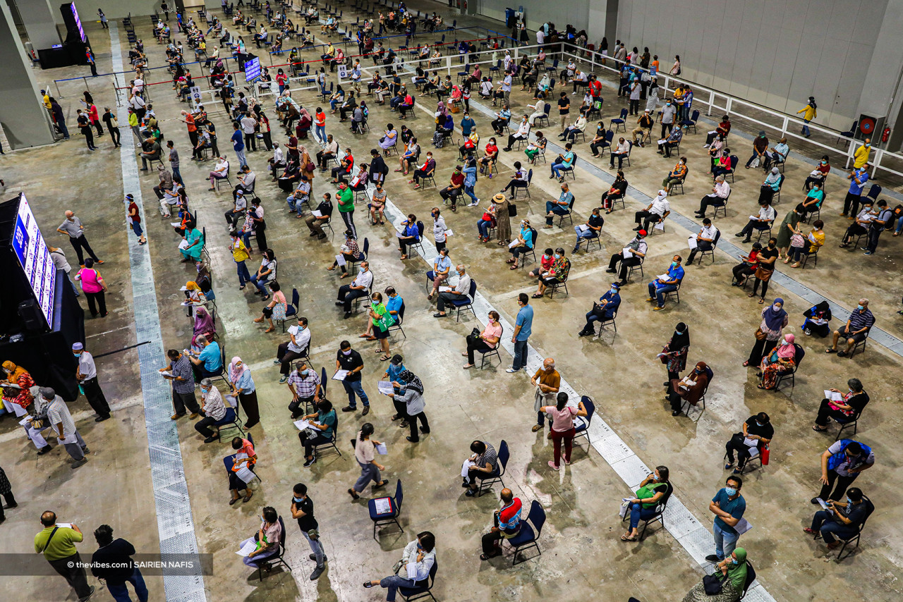 People waiting their turn to get the Covid-19 jab at the Mitec vaccination centre recently. – The Vibes file pic, June 5, 2021