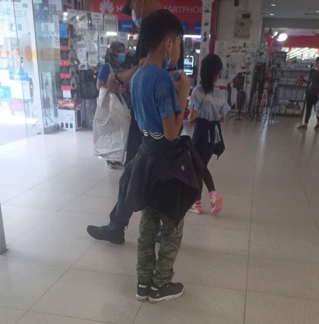 A child out shopping with his family in Sabah yesterday. – File pic, February 22, 2021