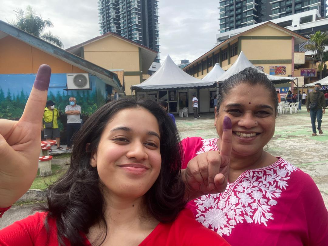 First time voter H. Arundhati Devi, who voted at SMK Desa Perdana, Taman Desa, with her mother, lawyer Vijayalakshmi N.R. Pillai, feel that the voting process was very organised and the staff were extremely helpful. – The Vibes pic, November 19, 2022