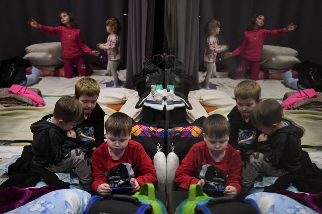 Children play inside a shelter for refugees at the Lviv Regional Academic Puppet Theatre in western Ukraine on Saturday. – AFP pic, March 7, 2022