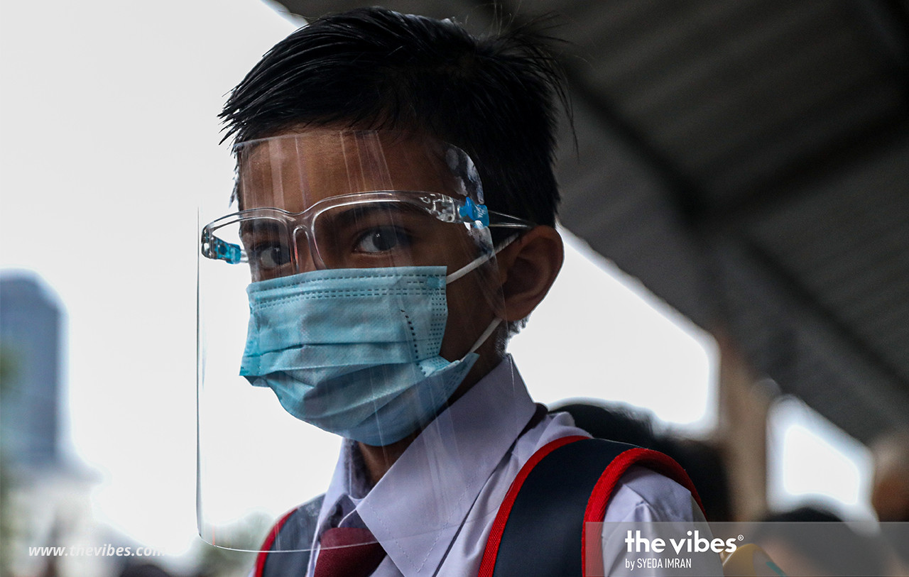 A boy wearing a face shield as an extra precaution as schools reopen under strict health SOPs today. – SYEDA IMRAN/The Vibes pic, March 1, 2021