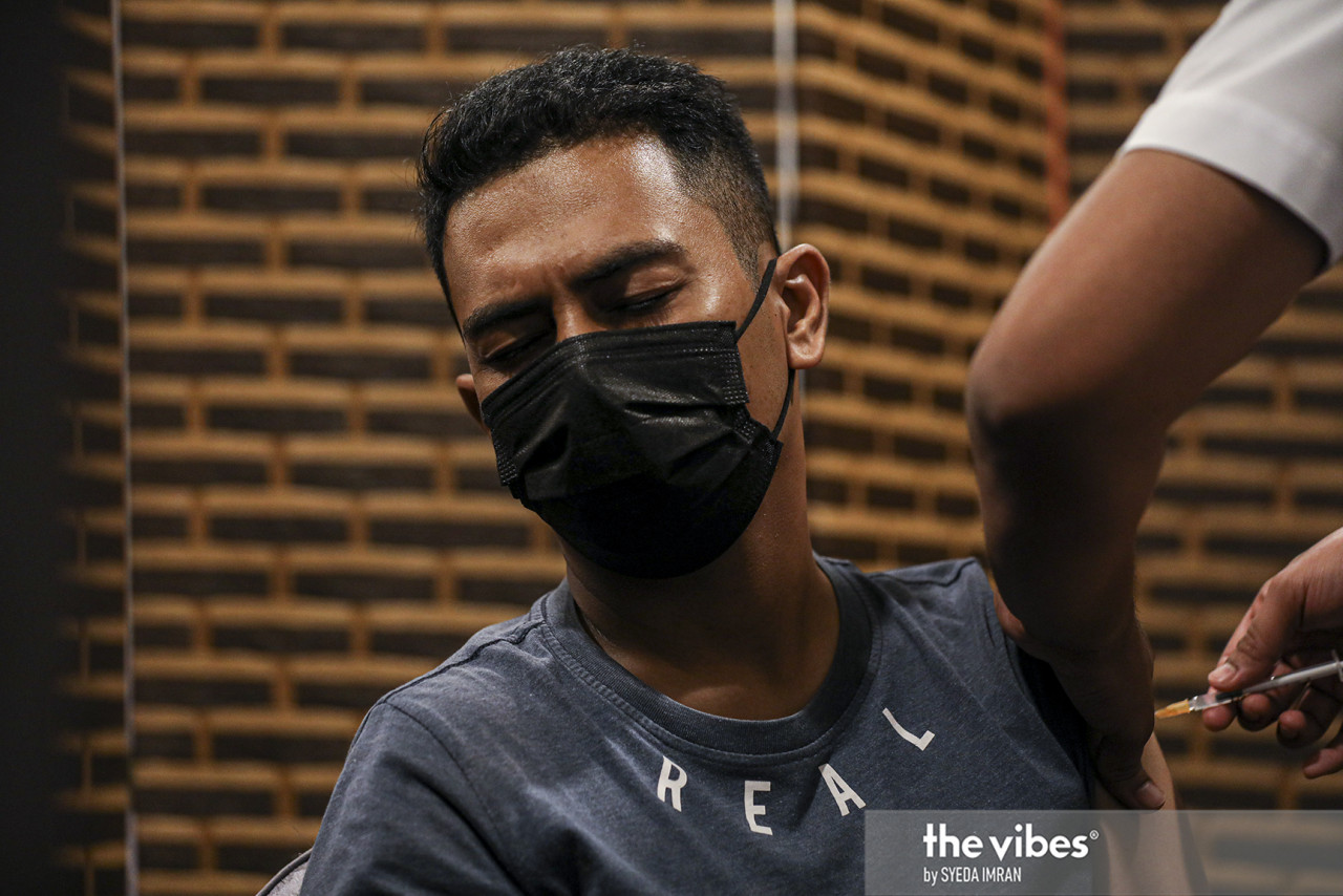 While awaiting her turn to get the Covid-19 jab, the writer saw a Civil Defence Force man who was nervous about getting the injection. – The Vibes file pic, May 3, 2021