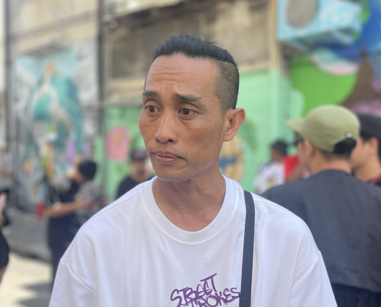 Crig Francis, 45, says the art project was done to shed the negative stigma of Kota Kinabalu’s backalleys. – JASON SANTOS/The Vibes pic, October 30, 2023 