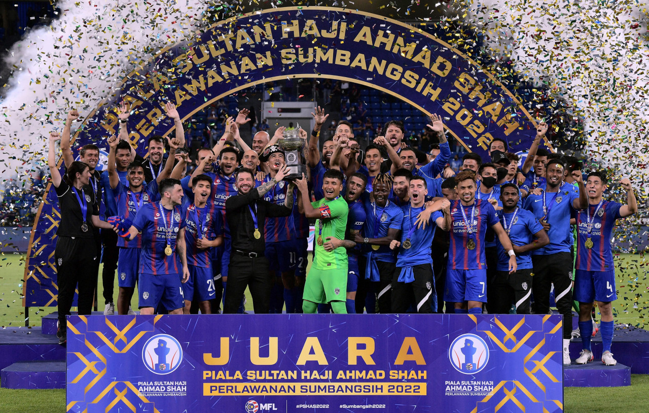 Johor Darul Ta’zim celebrates with the Charity Shield after winning 3-0 against KL City FC on February 26, 2022 at the Sultan Ibrahim Stadium. – Bernama Pic, February 27, 2022