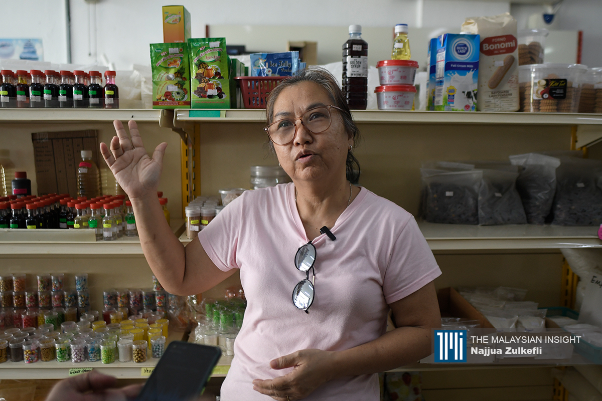 Han Siew Peck, 57, who sells baking supplies, says she prefers to live in a small town where it is not busy and the traffic is light. – The Vibes pic by Najjua Zulkefli, April 8, 2024.