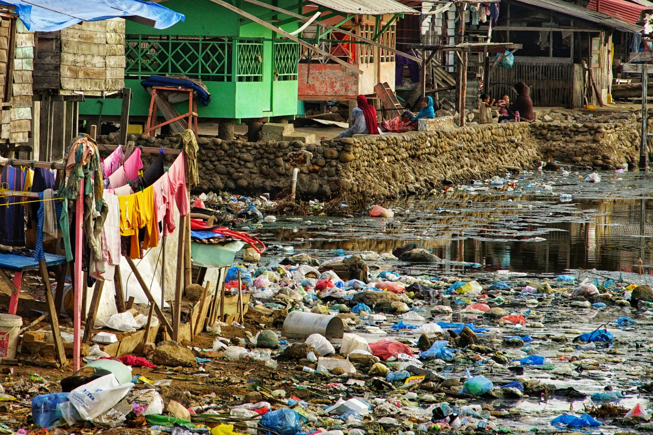 This picture shows rubbish washed ashore next to homes beside a river mouth at a coastal village in Lhokseumawe, Indonesia’s Aceh province on June 3, 2021. One environmental NGO found microplastics contamination in 68 rivers from 24 provinces in Indonesia. – AFP pic, February 10, 2023